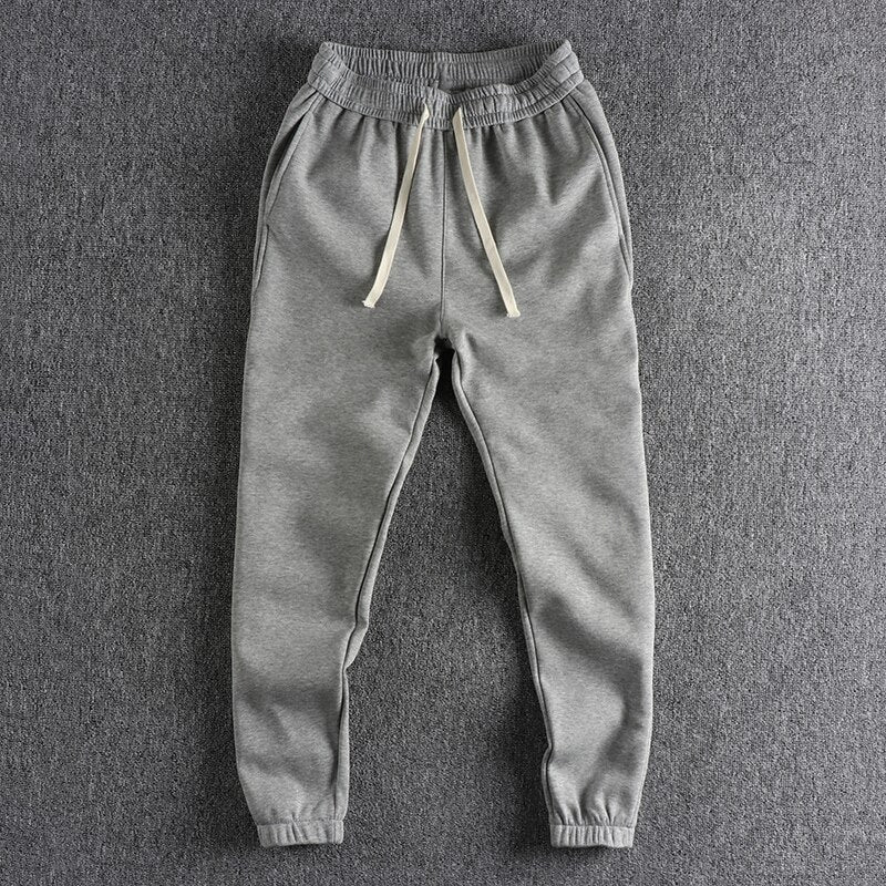 Plush thickened high-density knitted fabric side splicing casual pants men solid loose leggings