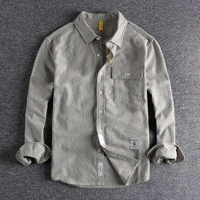 Textured long sleeved shirt men loose simple pocket youth shirt