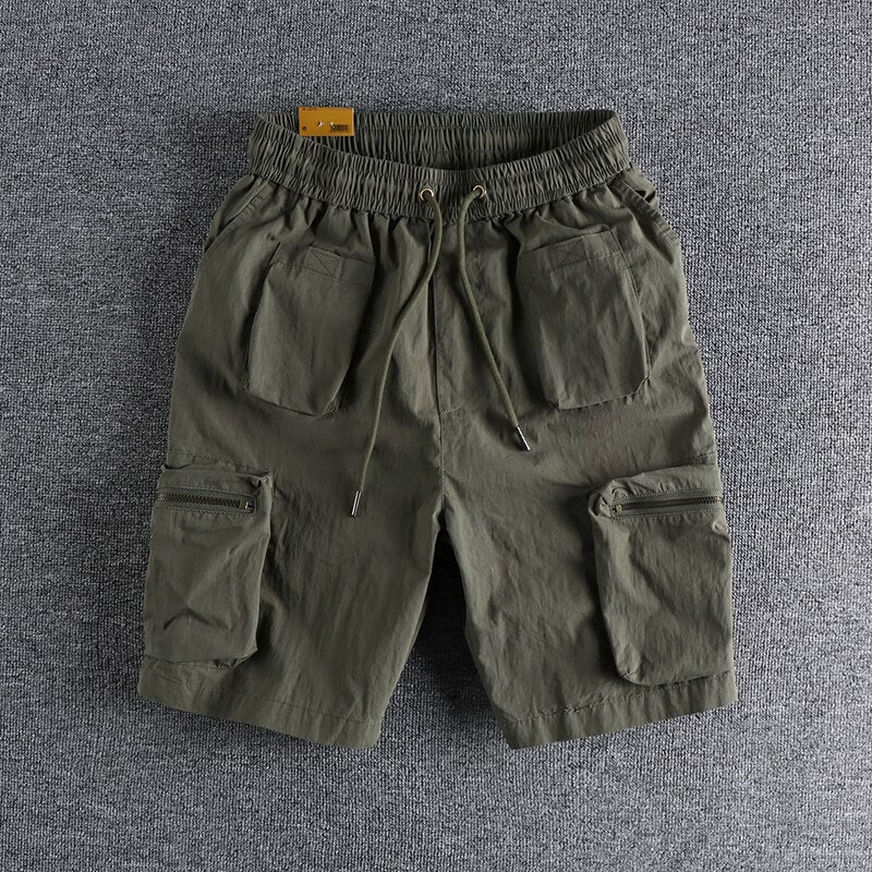 Summer trend solid casual shorts men three-dimensional pocket loose youth five point pants